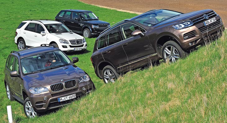 Гонка на вершину: покупаем VW TOUAREG или BMW X5?