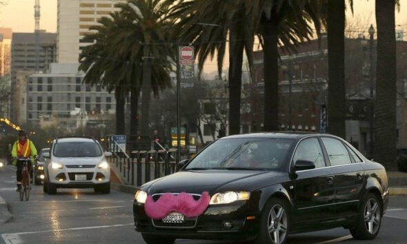 General Motors инвестирует $500 млн в приложение для заказа такси Lyft